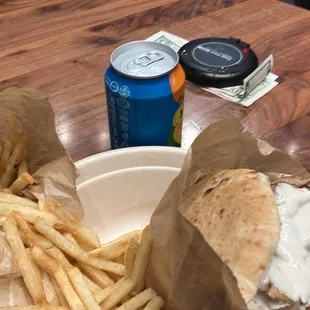 Türkiye Shawarma with fries and lots of tahini with a kind of spring mango I Favorite