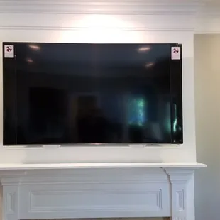 Custom Mounted TV over Fireplace