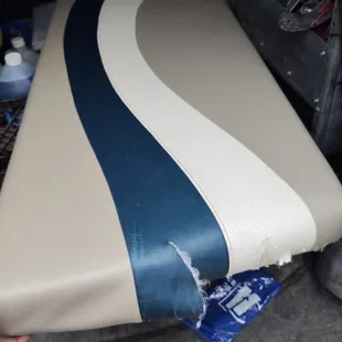 Torn seat before repair.