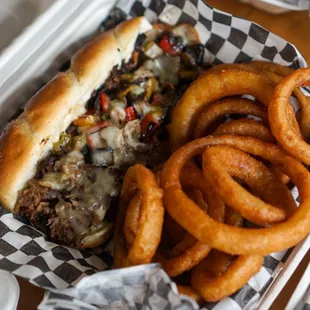 Philly Cheesesteak &amp; Onion Rings - IG: @nelson_eats