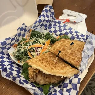 Chicken and waffle sandwich with kale salad