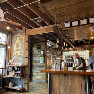 a man and a woman at a bar