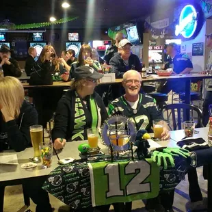 They are set up and cheering on the Hawks for every game!