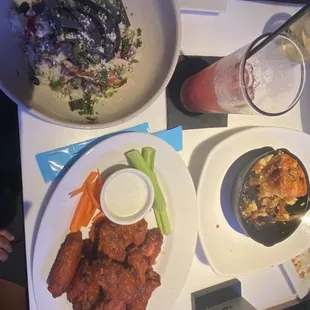 Traditional wings and southwest chicken bowl (destroyed cornbread in background).