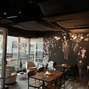 a black and white photo of a bar