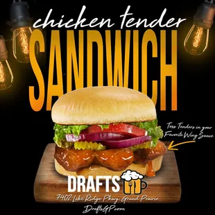 a sandwich on a wooden cutting board