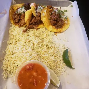 Tres barbacoa o birria tacos   with rice and beans