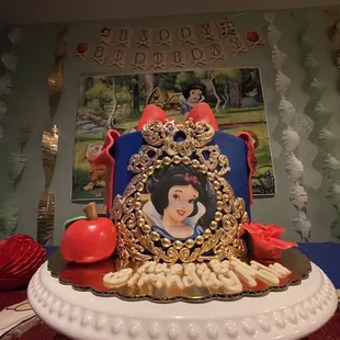 Snow White themed birthday cake. Vanilla cake, mixed fruit filling, vanilla buttercream.