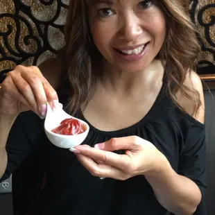 Caroline trying her first beet dumpling