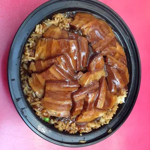 Pork belly with mustard greens over rice