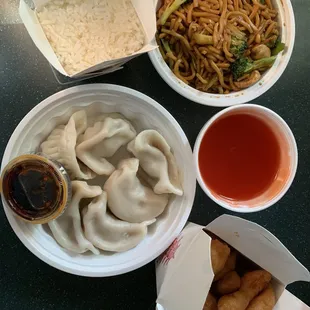 Steamed dumplings, vegetable lo mein, sweet and sour chicken