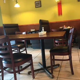 a table and chairs in a restaurant