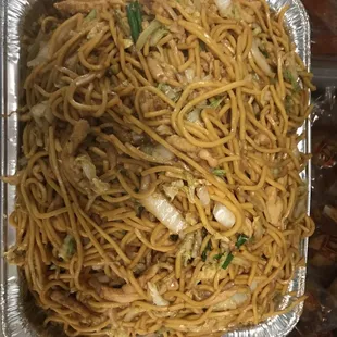 a pan of noodles and meat