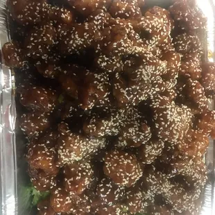 a container of sesame chicken