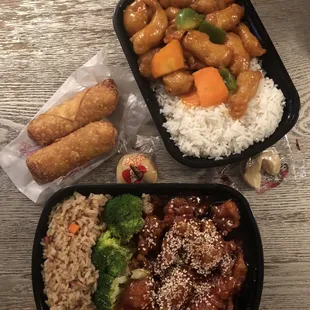 a meal of rice, meat, and veggies
