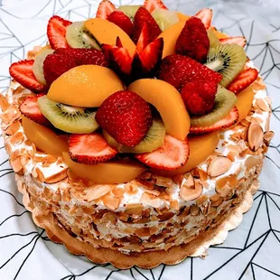 Half banana, half strawberry filling, topped with fresh fruit with almonds!