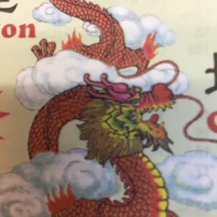 a dragon flying through the sky