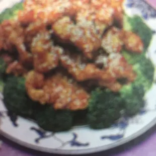 a plate of chicken and broccoli