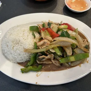 Basil pork with white rice, medium heat.