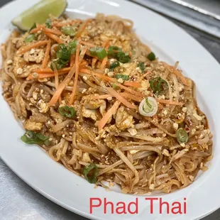 Rice noodles stir-fried with your choice of Meat, egg, bean sprouts, and topped with ground peanuts, carrots, scallions and lime.