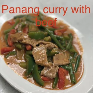 A spicy homemade Thai red curry prepared with coconut milk, bell peppers, string beans and ginger. Your choice of meat.