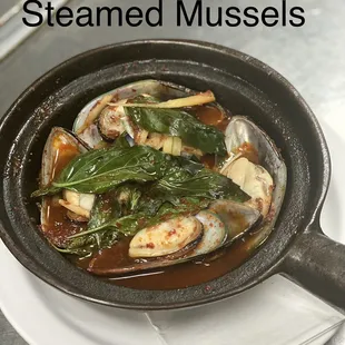 Green mussels steamed with basil leaves and house spicy sauce in lemon grass broth.