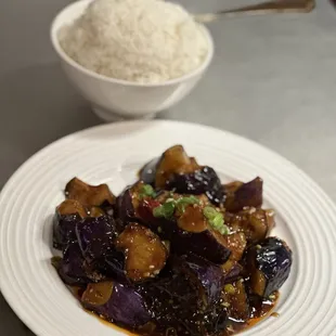 Eggplant with Garlic Sauce with a side of Steamed