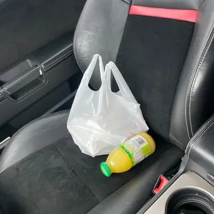 a car seat with a plastic bag in it