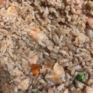 a plate of rice and shrimp