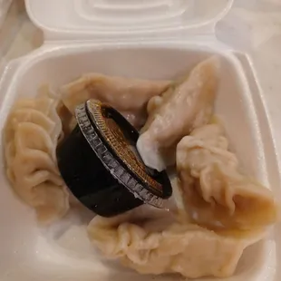 Pork and ginger dumpling priced at about nine dollars