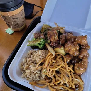 Combination plate; rice/chow mein, orange chicken and chicken teriyaki.