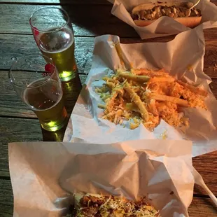 Grants weenie, regular bacon dog with grilled onions, and some of the best damn cheese fries I&apos;ve ever had.