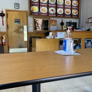 a table with a bottle of water on it