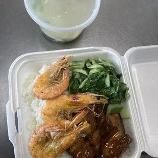 a meal in a styrofoam container