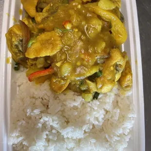 chicken curry and rice in a styrofoam container
