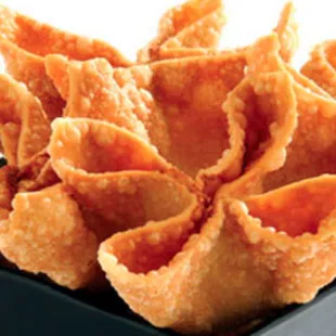 a closeup of a bowl of crisped tortillas