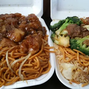 two takeout containers with noodles and meat