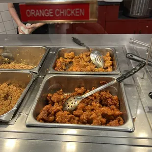 a buffet with a variety of food items