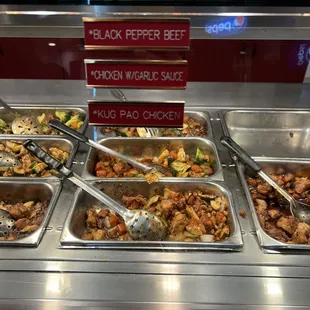 a buffet with a variety of food items