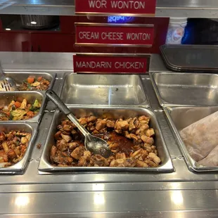 a buffet with a variety of food items