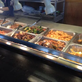 a buffet with a variety of food items