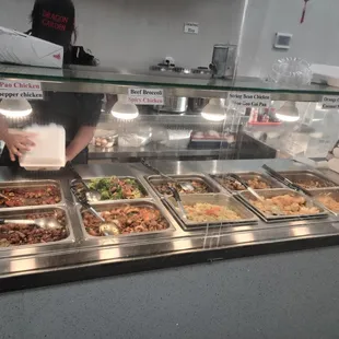 a buffet with a variety of food items