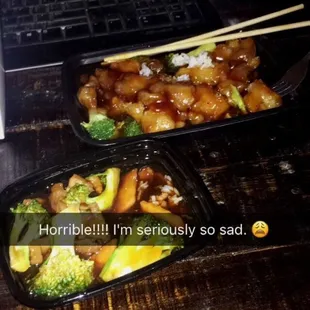 two trays of food on a table