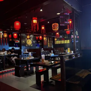 red lanterns and wooden booths