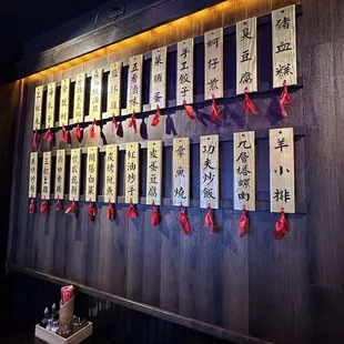 Manu marked on wooden board