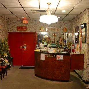 Front counter with Red Door leading to the Parking lot