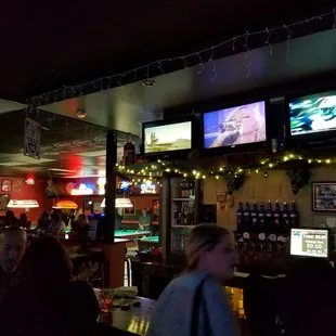people sitting at the bar