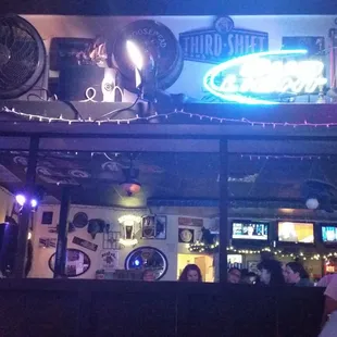 a woman sitting at a bar