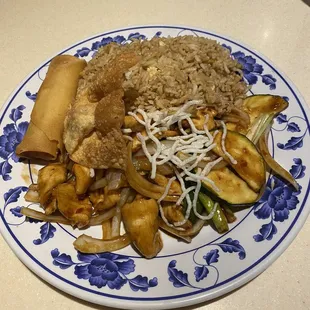 Mongolian Chicken lunch special with egg roll and wonton.