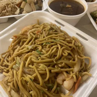 noodles and shrimp in a styrofoam container